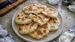 Πιτάκια με γιαούρτι στο τηγάνι: αφράτα, εύκολα και χωρίς μαγιά