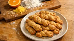 Κουλουράκια λαδιού με σουσάμι: τραγανά και αρωματικά με πορτοκάλι